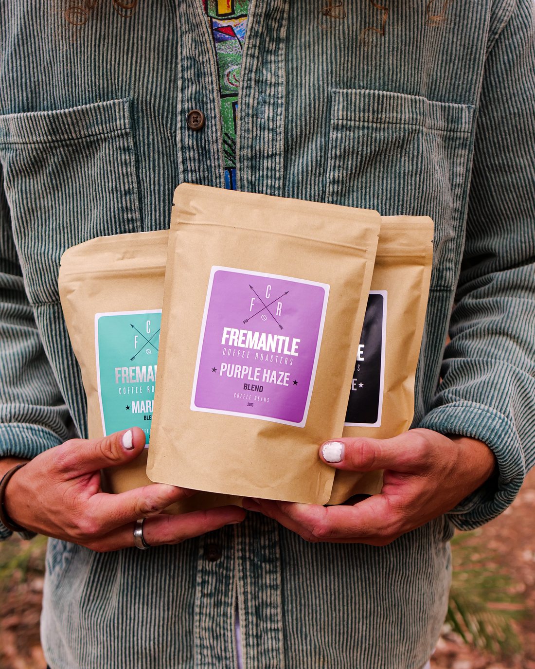 Beach portrait with product in frame